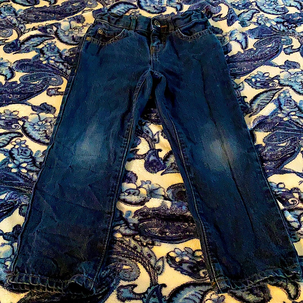 Distressed blue jeans